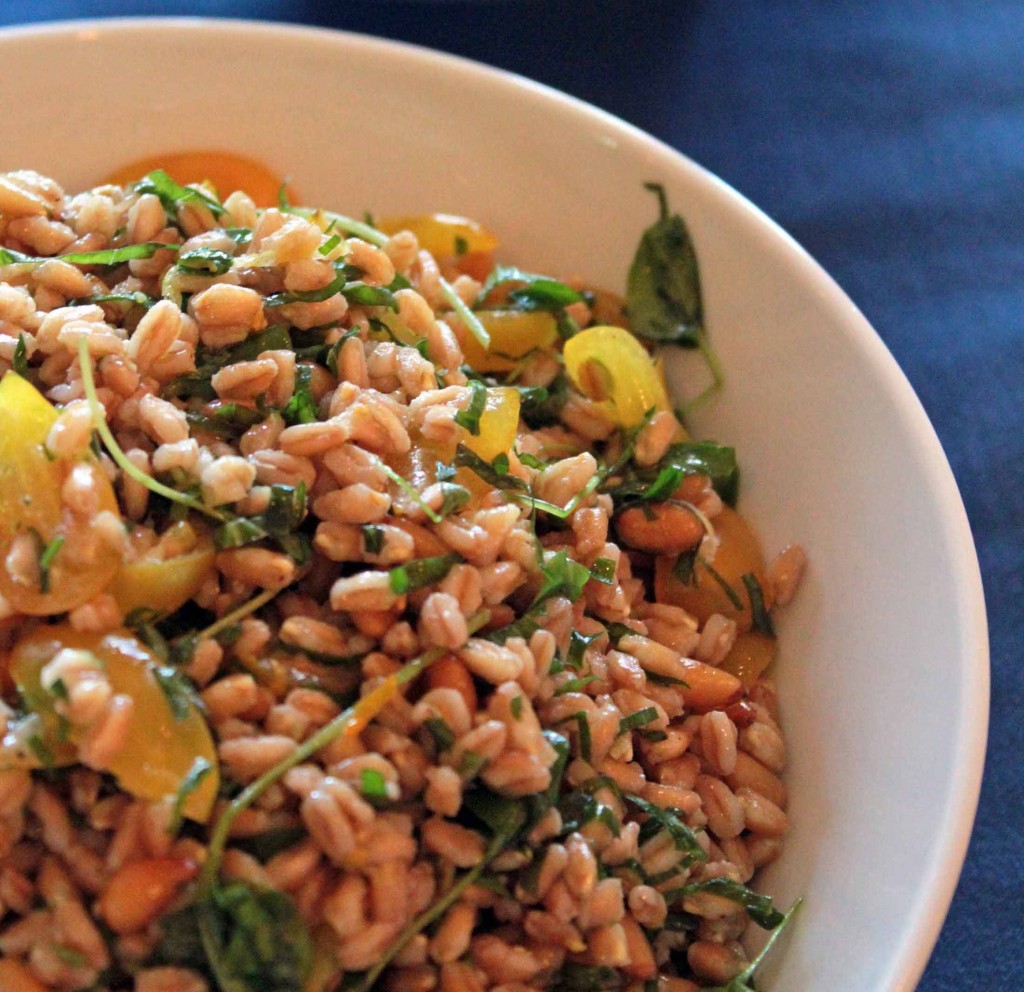 cold salad with  farro, garlic, parsley, watercress, pine nuts, olive oil and yellow cherry tomatoes