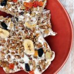 Honey sweetened Greek Yogurt is covered with California walnuts and dried tropical fruit, then frozen into a bark that can be broken for a healthy and delicious snack.